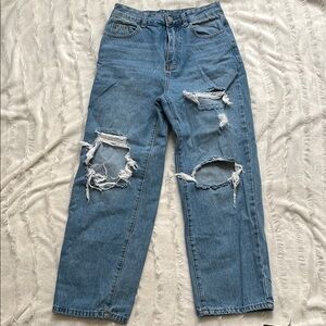 Distressed Blue Denim Jeans
